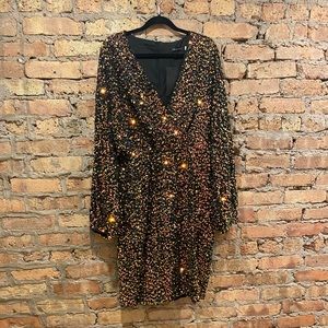 Long sleeve sequin dress. Black. Size 2XL.